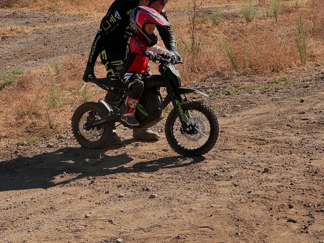 A kid trying to ride mantis mini R